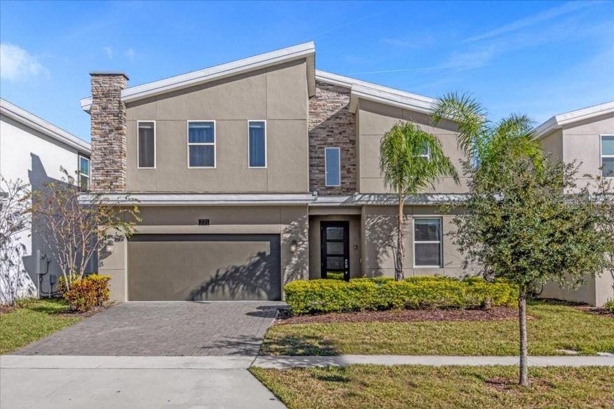 This is the vacation home you've been dreaming of. A rare opportunity to own this stunning 9-bedroom, 5-bath, fully furnished, turnkey short-term rental home, perfectly positioned on the 5th hole of a breathtaking golf course. Located in the highly sought-after, gated resort community of ChampionsGate.

Just unpack and start enjoying your vacation—or begin earning immediate income from this incredible investment property. Step through the front door, switch off your electronics, and settle into your home away from home.

After an exciting day at the theme parks, unwind in your private heated pool and spa while soaking in panoramic golf course views—with no rear neighbors, offering exceptional privacy. Sip your favorite beverage while preparing dinner on the outdoor BBQ, or cook up a storm in your gourmet kitchen, featuring quartz countertops, 42” cabinets with crown molding, and stainless steel appliances.

The open-concept layout is perfect for entertaining—whether you’re cooking, watching TV, playing board games, or simply relaxing with loved ones. There’s seating for 5 at the breakfast bar and a large dining table that comfortably seats 10 guests.

Got a second wind after dinner? Head to the game room. Prefer to kick back? Enjoy movie night in your private theater room.

When it’s time to rest, retreat to one of your nine beautifully appointed bedrooms. The primary suite and an additional guest suite are conveniently located on the first floor for easy access—one of which includes private access to the pool. Upstairs, you’ll find two sets of Jack-and-Jill bedrooms, plus two additional guest rooms and another full bath—offering a total of 7 bedrooms and 3 bathrooms on the second level. Both first-floor suites offer full en-suites for maximum comfort and privacy.

Champions Gate offers resort-style amenities like no other. The Oasis Club, a spectacular 16,000 sq ft clubhouse, features a full-service restaurant and bar, movie theater, arcade/game room, business center, yoga room, Camp Oasis kids club, and a fully equipped fitness center. Outdoors, enjoy two large community pools, a water park, lazy river, tiki bar, sand volleyball courts, basketball, tennis courts, dog park, and air-conditioned cabanas. Golf enthusiasts will love the 18-hole championship golf courses, and there’s even a second clubhouse and water park for added fun.

ChampionsGate is a secure, gated community with 24-hour surveillance—all included in your HOA fees, which also cover basic cable TV, high-speed internet, lawn care, and trash pickup.

Be sure to view all photos, 3D tour, and Matterport walkthrough to fully experience the beauty and value this home offers.

And best of all—you’re just minutes from world-class attractions, shopping, dining, the Orlando International Airport, and just over an hour from Florida’s stunning beaches.