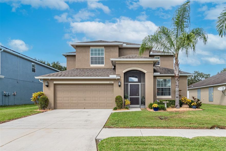 So much sq footage for the $$$$ , with a "drop dead" georgous pool!  Welcome to River Bend. This exceptional move in ready home has been meticulously maintained and has fabulous artistic details.  This 3245 sq ft pool home boasts 5 bedrooms, 3 baths, 3 car tandem garage, perfect for longer trucks, theater room, resort style pool area, and vegetable gardens.  As you enter the front door the foyer is open all the way through the second floor giving a grand sense of space complete with lovely archways and architectural niches.  The formal living and dining areas are anchored by a beautiful artistic textured wall that wraps around to the kitchen.  The kitchen overlooks the family room and has granite counters, beautiful cabinets and stainless-steel appliances and a large pantry off the breakfast nook.  Out the French doors is pure paradise.  The heated saltwater pool and spa were added in March of 2021 and offers complete relaxation with beautiful lighting, and a sun shelf.  Pool deck boxes and top of the line pool cleaner convey with the home.  Paver bricks, screened lanai and part under roof for year round outdoor living.   You will find multiple raised vegetable gardens lemon trees, pineapples, blueberries, blackberries and asparagus among other things. Back inside you have a bedroom and bath downstairs and the cutest laundry room ever.  At the top of the stairs is a lovely open loft that acts as a central foyer to all the bedrooms and a fabulous theater room. To the right is the primary owners suite that is enormous!  The en-suite bath includes a separate shower, garden tub, dual sinks 2 walk in closets and a linen closet.  This home has a ridiculous amount of storage and closets! The theater/media room will be left for you to just start enjoying!  Seller to leave the theater seating with recliners, projection screen, projector, sound system and black out curtains.  Literally plug and play! 3 more generous sized bedrooms and another full bath round out the second floor. One of the AC units has been replaced in 2023. Home comes with hurricane shutters, irrigation and a 50 gal water heater replaced in 2023. Schedule your appointment today!