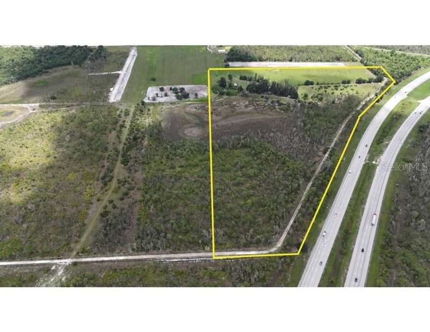 Charming Old Florida Property with Endless Potential

This beautiful piece of Old Florida offers a unique opportunity to create your dream homestead or establish the perfect farm. With 1,827 feet of frontage along Highway 75, this property also offers exceptional accessibility and visibility—ideal for agricultural, residential, or investment purposes.

The land features a gated entrance and is mostly fenced, making it well-suited for cattle or other livestock. An old barn and a 1968 house are located on-site—neither are currently livable and would require full renovation or removal, providing a blank canvas for your vision.

The landscape is naturally diverse and scenic, boasting high-ground pasture ideal for grazing, a flag pond, and a mix of classic Florida flora, including palmettos, mature pines, and majestic oaks.

Whether you're looking to build a peaceful retreat, start a working farm, or invest in land rich with potential and character, this property is a rare find.