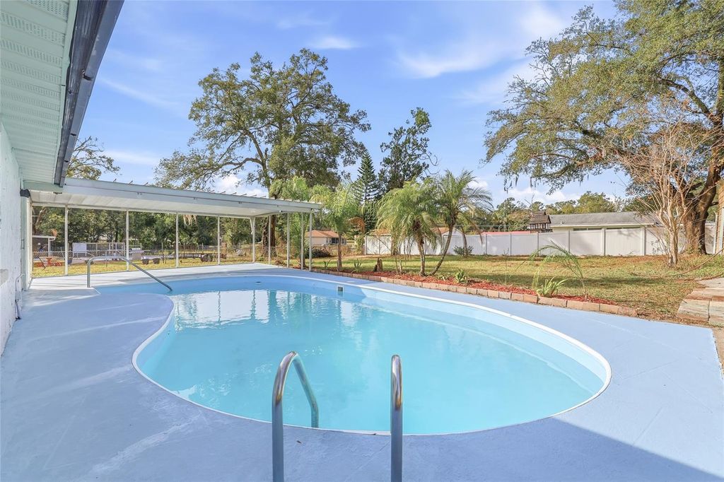 Photo of 12147 Scott Drive, Dade City, FL 33525 (MLS # TB8456962)