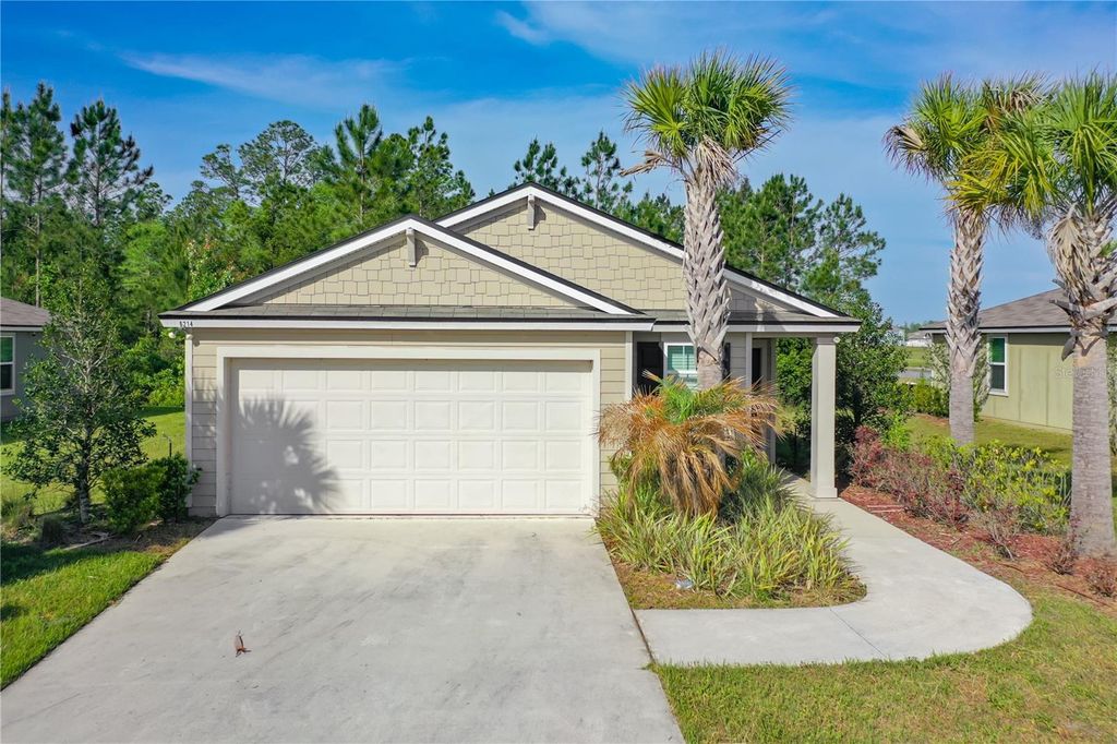 Photo of 6214 Wild Mustang Trl, Jacksonville, FL 32234 (MLS # O6423049)