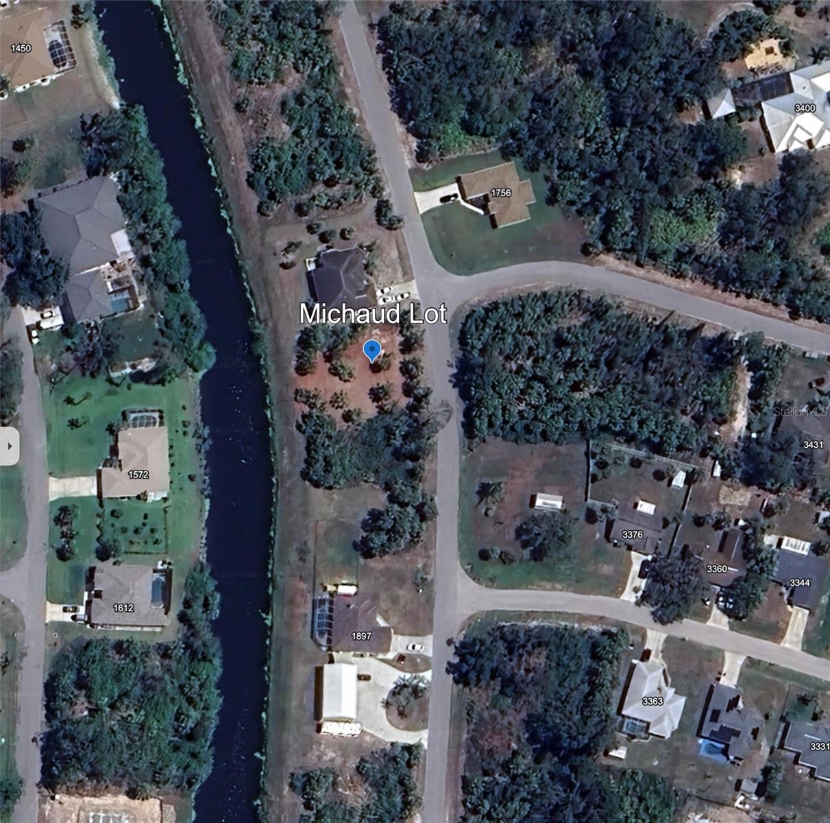 Cleared and filled lot on a freshwater canal and is not in a flood zone or HOA. Makes a great building site! In an up-and-coming neighborhood. Close to shopping, golf, restaurants and parks. Come and check this one out!