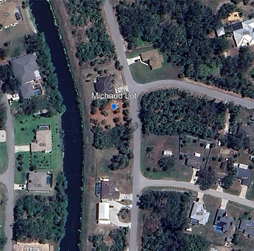 Cleared and filled lot on a freshwater canal and is not in a flood zone or HOA.    Makes a great building site!  In an up-and-coming neighborhood. Close to shopping, golf, restaurants and parks. Come and check this one out!