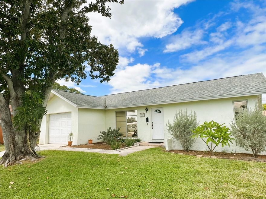 Discover The Lakes! A wonderful opportunity is available in this 55+ plus deed restricted community. Your low HOA fees include lawn maintenance, basic cable, internet, heated community pool, club house, shuffleboard courts, escrow reserves, and reclaimed water! Simple landscaping showcases one of the largest corner lots in this neighborhood at an incredible price. This well-maintained and truly loved home in a quiet cul-de-sac offers potential buyers a sanctuary that is ready and waiting for relaxation and peaceful living. This spotless and classic (2) bedroom, (2) bath (1) car garage home has great flow and is laid out just perfectly. The spacious living dining combination have lovely views to the front and to the rear of this bright, airy home. Softly carpeted and painted in soothing neutrals, the kitchen has a gleaming wood look kitchen floor, mullioned oak cabinets, and granite countertops. The meticulously clean one car garage comes complete with storage cabinets, shelving, pegboard for easy organizing, and conveys with a tastefully covered washer and dryer. The living room and the primary bedroom's sliding glass doors lead to your large screened lanai that is the perfect place to relax, sip, and watch the sky change colors as the birds chirp away. The primary bedroom also features a separate vanity area and spacious walk-in closet. This lovely home can be enjoyed just as it is or can become the perfect canvas for your fashionable upgrades. The kitchen has been modified to accommodate a central cable/ internet whole house hub. A/C installed in 2013 but runs perfectly.Refrigerator, dishwasher, and dryer all replaced in 2018. Solar protection film on the windows keeps the home cool and the electricity bill down and all of the tasteful window treatments convey with the home. The roof was replaced in 2018 and a brand new water heater was installed in 2023. Leasing is allowed and your pets are welcome! Clink on the link for a 3D virtual tour and take a wander through...this home won't last long at this price, so schedule your showing today!