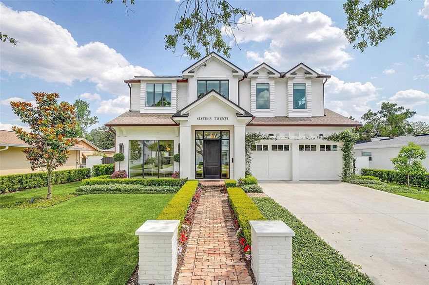 This stunning custom home, completed in 2021, is located among the highly desirable “tree streets” in the heart of Winter Park, and was custom-built by M. Lahr Homes, showcasing exquisite craftsmanship and thoughtful design. With high-end finishes and custom details hand-selected by the owners, this home is sure to check every box.
Designed with both luxury and functionality in mind, the home is equipped with natural gas for the cooktop, water heater, pool heater, grill, and fireplaces, while smart technology enhances modern living with app-controlled kitchen appliances, thermostats, irrigation, pool equipment, and garage doors. Neutral wood flooring, Restoration Hardware lighting, and custom electronic window treatments by The Shade Store add to the home’s understated sophistication. Additional highlights include copper gutters, level 5 finished walls, designer wall coverings, and custom storage throughout.
Offering nearly 4,000 sq. ft. of organic, modern design, the open floorplan blends functionality with timeless elegance. The expansive living and dining areas flow seamlessly into the kitchen, which features Thermador smart appliances, quartz countertops, and a massive island with a stylish open-shelving detail. A hidden walk-in pantry behind the kitchen adds a bar fridge, microwave, and abundant prep space. 
The downstairs Primary Suite is a serene retreat with pool views through a picture window, a spa-like bathroom with a soaking tub and glass-enclosed shower, and an oversized, custom walk-in closet. A second main-level suite with a full bath and walk-in closet is currently used as an office overlooking the front lawn.
Upstairs, a spacious bonus room/living area is surrounded by (3) additional bedrooms, each with walk-in closets, and (2) full bathrooms.
The outdoor living space is an entertainer’s dream. The 8 ft sliding glass doors, with 2 ft. transom windows above, open to a covered lanai with motorized screens, a gas grill, and a fireplace for year-round enjoyment. Beyond the lanai is a meticulously landscaped backyard, fully fenced for privacy, with a heated saltwater pool wrapped in artfully laid out artificial turf and travertine pavers.
Storage is abundant, with a custom-outfitted mudroom and laundry room, an oversized 2-car garage featuring storage shelves, and custom designed closets throughout.
Ideally located, this home offers easy access to downtown Winter Park, Park Avenue, the YMCA, Aloma shopping center, and Whole Foods.