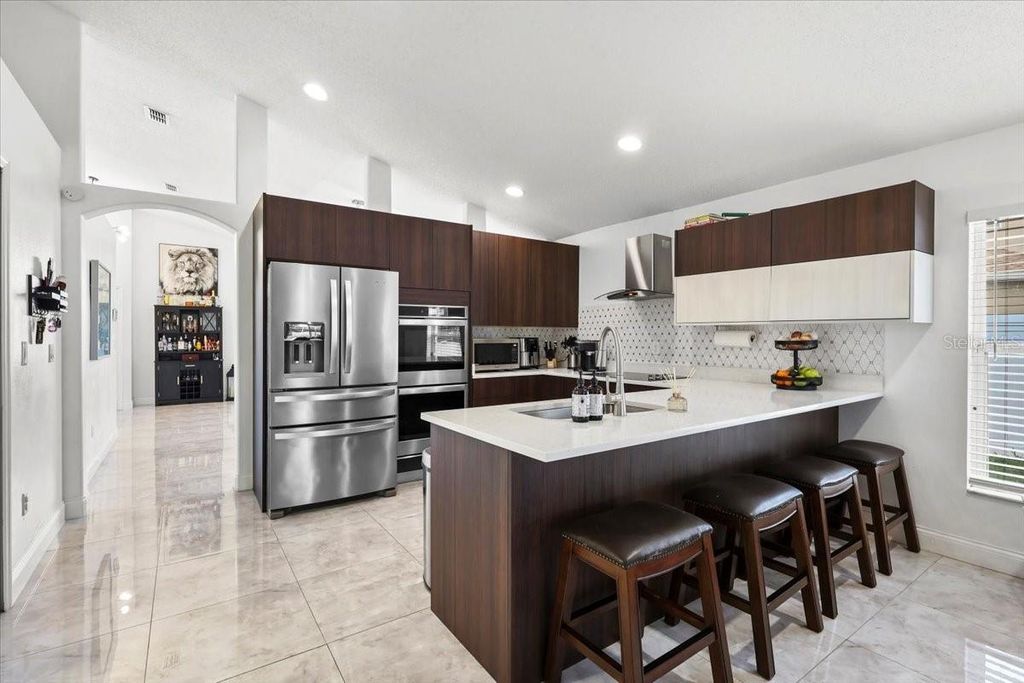 Photo of 6847 Bouganvillea Crescent Drive, Orlando, FL 32809 (MLS # O6408753)