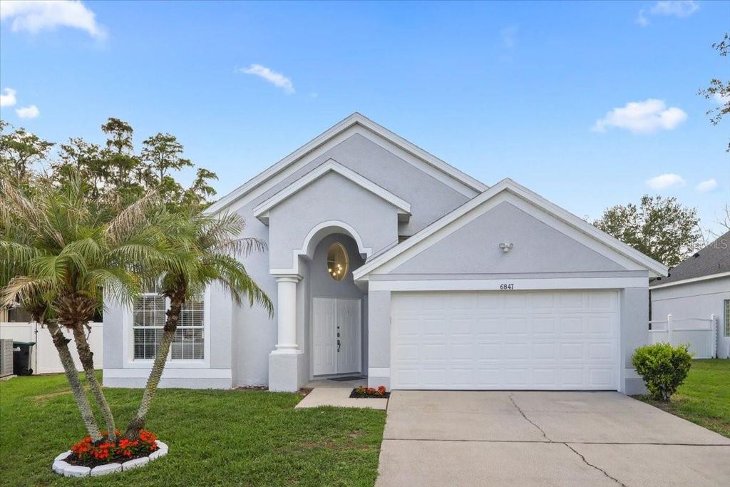 Photo of 6847 Bouganvillea Crescent Drive, Orlando, FL 32809 (MLS # O6408753)