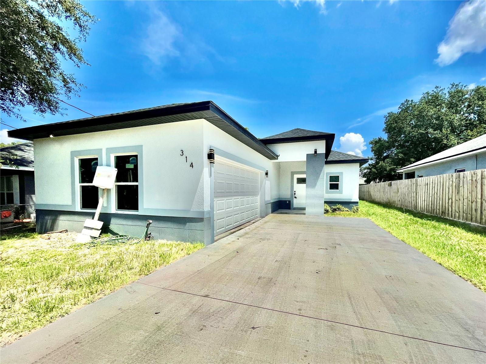 New Custom Build – Ready for Quick Move-In! NO HOA! Seller is willing to assist with some buyer closing costs or a possible rate buy-down with an acceptable offer—making this beautiful home even more affordable.
Why wait to build when you can own this brand-new custom home today? Recently completed and thoughtfully designed, this 4-bedroom, 2-bath home offers quality craftsmanship, a smart layout, and exceptional value.
Step inside to an open Great Room floor plan that flows seamlessly into the kitchen, perfect for both everyday living and entertaining.
Interior Highlights:
Gorgeous kitchen with crown molding, raised panel staggered-height cabinetry, and granite countertops (granite counter tops also in all bathrooms).
Extra-large granite prep/breakfast bar.
Stainless steel appliances included: refrigerator with ice maker, dishwasher, range, microwave.
Upgraded tile flooring in main & wet areas.
Ceiling fans in all bedrooms.
Stylish upgraded light fixtures throughout.
Master suite with oversized walk-in closet, two sinks, and a spa-style walk-in shower with Rain shower head.
Additional Features:
Side-entry garage for curb appeal & convenience.
No HOA—enjoy more freedom and flexibility.
Minutes to the 429 & 414 Maitland-Exchange. Easy access to the 408 and FL Turnpike via the 429. Approximately 5 minutes to Publix. 5 minutes to Downtown Ocoee and 10 minutes approximately to Downtown Winter Garden that has a 29 mile bike trail, many eateries and a microbrewery. Approx. 30 minutes to Downtown Orlando. Approx. 40 minutes to Disney and Universal.
With its modern design, upscale finishes, this move-in ready home delivers both comfort. Schedule your private tour today before it’s gone! Buyers to verify all information contained within. Information deemed reliable but not guaranteed.