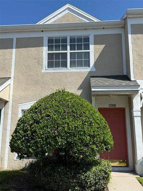 Photo of 11310 Cayman Key Avenue, Tampa, FL 33624 (MLS # TB8464511)