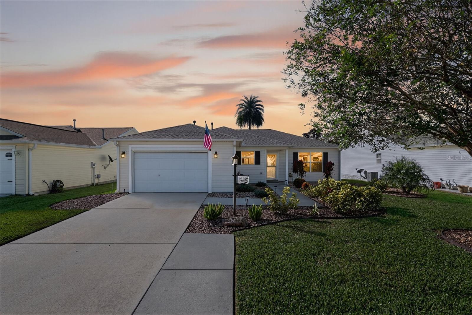 FABULOUS, METICULOUSLY-MAINTAINED, TURNKEY 3/2 Corpus Christi featuring a WONDERFUL SCREENED LANAI and REAR PAVER PATIO in the highly sought after Village of Woodbury! LOW BOND - only $1,573! ROOF (2020) This AMAZING home is MOVE-IN READY! LOW-MAINTENANCE, STONED planting beds and an ELEGANT LEADED-GLASS door welcome you in to the foyer of this MAGNIFICENT home! The OPEN-CONCEPT floor plan seamlessly connects the living, dining, and kitchen areas, creating a BRIGHT, SPACIOUS main living space. A strategically placed SOLAR TUBE, near the dining area, fills the home with ABUNDANT NATURAL LIGHT while LUXURY VINYL PLANK flooring extends throughout the ENTIRE home, offering a sleek, MODERN look and easy, LOW-MAINTENANCE living! The STUNNING kitchen boasts WHITE cabinetry with PULL-OUTS, QUARTZ countertops, TILE backsplash, under-cabinet LIGHTING, hallway PANTRY, and an EAT-IN breakfast bar for casual dining. From the living room, step through the sliding glass doors into the inviting screened-in LANAI complete with a ceiling fan and CHARMING café lights. This FANTASTIC OUTDOOR RETREAT is the perfect spot to ENJOY your morning coffee or UNWIND while taking in the GORGEOUS Florida weather! Just outside, an ADJACENT PAVER PATIO provides the ideal space for grilling and entertaining! Back indoors, the primary bedroom features LVP flooring and a GENEROUS WALK-IN closet. Its en-suite bathroom boasts WHITE cabinetry with QUARTZ countertops, a WALK-IN shower, and a LINEN closet. A SPLIT FLOOR PLAN with two additional bedrooms and a second bathroom ensures a PRIVATE guest wing and/or a QUIET home office. Bedroom two offers LVP flooring, DOUBLE windows, and a built-in closet. The second bathroom features a WHITE vanity with QUARTZ countertop, tub and shower combination, and a LINEN closet. Bedroom three (No closet) offers DOUBLE windows. This additional room can function as either a home office, den, or an additional sleeping area for guests. Completing the package is a 18’x25’ one and half car garage boasting a GENEROUS laundry area with shelving and hanging rod, additional corner shelving, a PHANTOM RETRACTABLE GARAGE DOOR SCREEN, and PLENTY of space for a car and a golf cart! DON’T MISS YOUR OPPORTUNITY TO OWN THIS GORGEOUS TURNKEY HOME! The Village of Woodbury is IDEALLY LOCATED close to Nancy Lopez Legacy Country Club and Championship Golf Course; Glenview Country Club and Championship Golf Course; Mulberry Grove Recreation Center; First Responders Recreation Center; First Responders Pitch-N-Putt Golf Course; Springdale Fitness and Walking Trails; Mulberry Dog Park; and Hwy 441 and CR466, offering an abundance of shopping, dining, banking, medical, and more! PLEASE WATCH OUR WALKTHROUGH VIDEO of this FABULOUS TURNKEY HOME and call today to schedule your Private Showing or Virtual Tour!