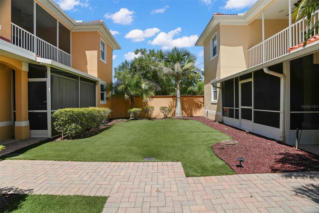 Photo of 21019 Sunpoint Way #201, Lutz, FL 33558 (MLS # W7890587)