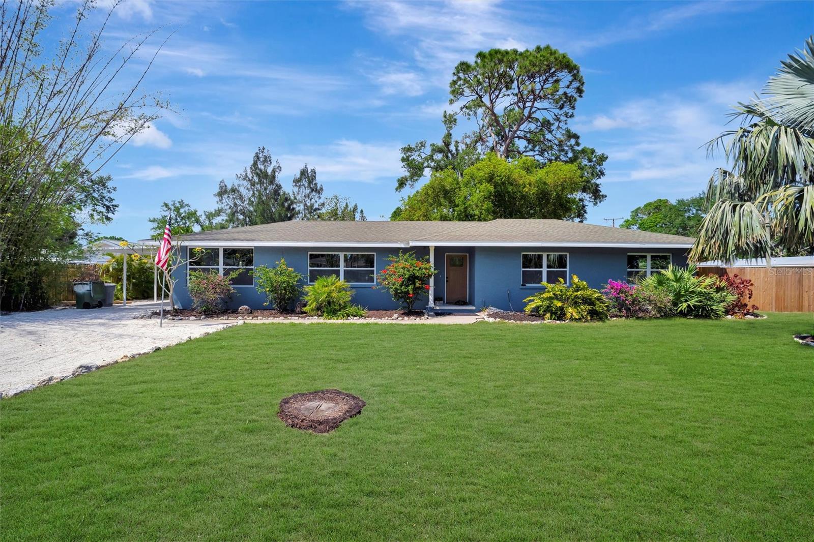 Welcome to this fully renovated 4-bedroom, 2-bathroom single-family home with a bonus detached mother-in-law suite, offering both modern luxury and versatile living options. The main home features brand-new stainless-steel appliances, sleek quartz countertops, a custom designed fireplace, and a stylish dry bar with a beverage fridge—perfect for entertaining. Additional updates include new tile flooring throughout, white shaker cabinets, a new water heater and stacked washer/dryer for added convenience. The master bedroom suite includes dual closets and slider access to the backyard with own patio. Two additional bedrooms and full bathroom with tub and shower combo are located off the hallway from the master bedroom. The 4th bedroom is located near the rear of the home just off the backyard access. Perfect for the additional bedroom space or acting as a home office. A bonus detached space has been fully renovated highlighted by the tile floors, shaker cabinets, butcher block countertops and oversized shower. The private bedroom is located just off the living space providing additional privacy for the resident. The oversized yard provides ample space for a pool and outdoor gatherings. With no HOA, the property offers endless possibilities: live in one unit and rent the other for additional income or utilize the entire space as a rental investment. You are a short distance to local attractions such as Robinson Preserve, De Soto National Memorial, and Palma Sola Bay, just bring your paddle boards and kayaks!! Boaters can drop in just down the street at Warner’s Bayou Boat ramp. You will be a short drive or boat ride away to the powdery sand beaches of Anna Maria Island and the Gulf of Mexico. Sport enthusiasts can enjoy the proximity to the Bradenton Golf & Country Club, GT Bray Park equipped with a brand new Pickleball facility that includes 20 courts, world-renowned IMG Academy, or catch a Pirates/Marauders baseball game at LECOM Park. Last, but not least you are quick drive to downtown Bradenton with rooftop and waterfront restaurants, a Riverwalk and park along the Manatee River, and a weekly farmer’s market on main street to explore. this home offers the perfect blend of comfort, location, and potential. Don’t miss your chance to own this gem in one of Bradenton’s most desirable areas! One or more photos have been virtually staged.