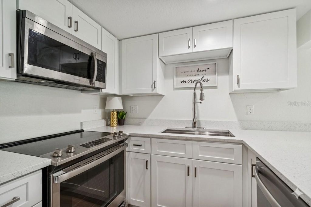 Photo of 718 Haven Place #718, Tarpon Springs, FL 34689 (MLS # TB8482503)