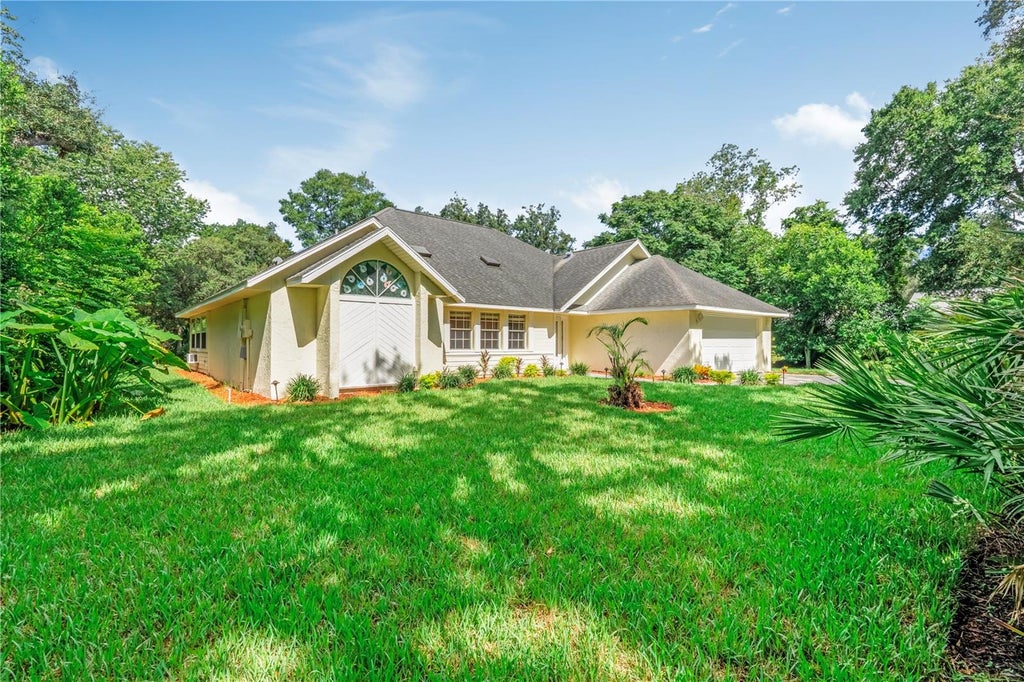 Photo of 5812 Nob Hill Boulevard, Port Orange, FL 32127 (MLS # V4950561)