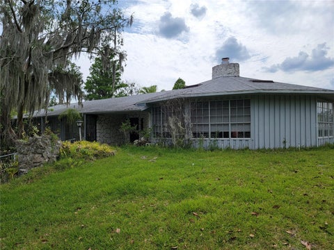 Photo of 920 Lake Cove Trail, Lakeland, FL 33813 (MLS # L4961807)