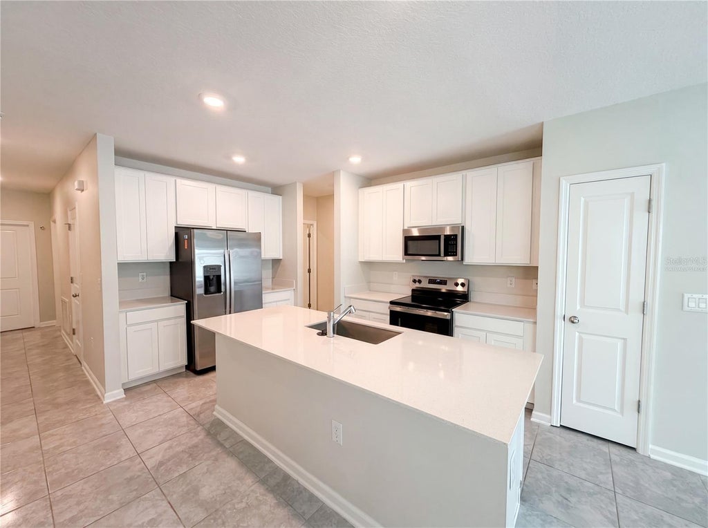 Photo of 2307 Burney Falls Lane, Davenport, FL 33837 (MLS # O6412703)