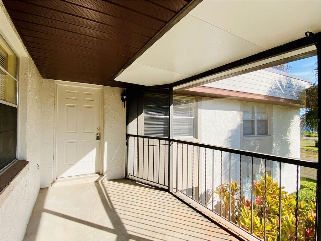 Photo of 64 Windtree Lane #203, Winter Garden, FL 34787 (MLS # O6366537)