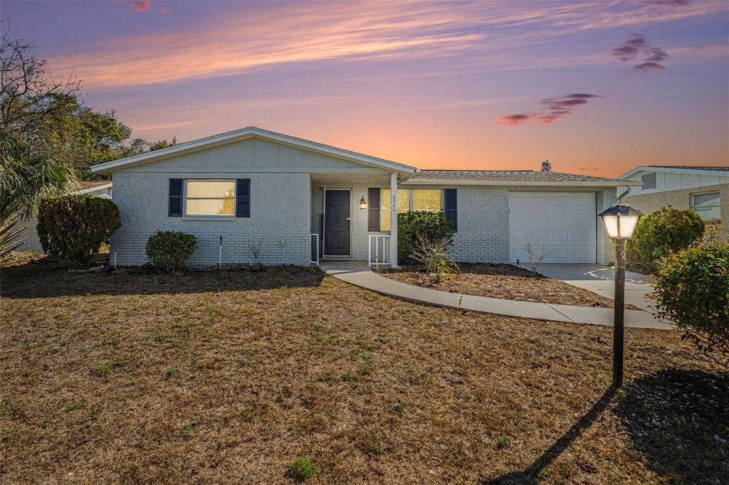 Photo of 9300 W Cochise Lane, Port Richey, FL 34668 (MLS # O6380874)