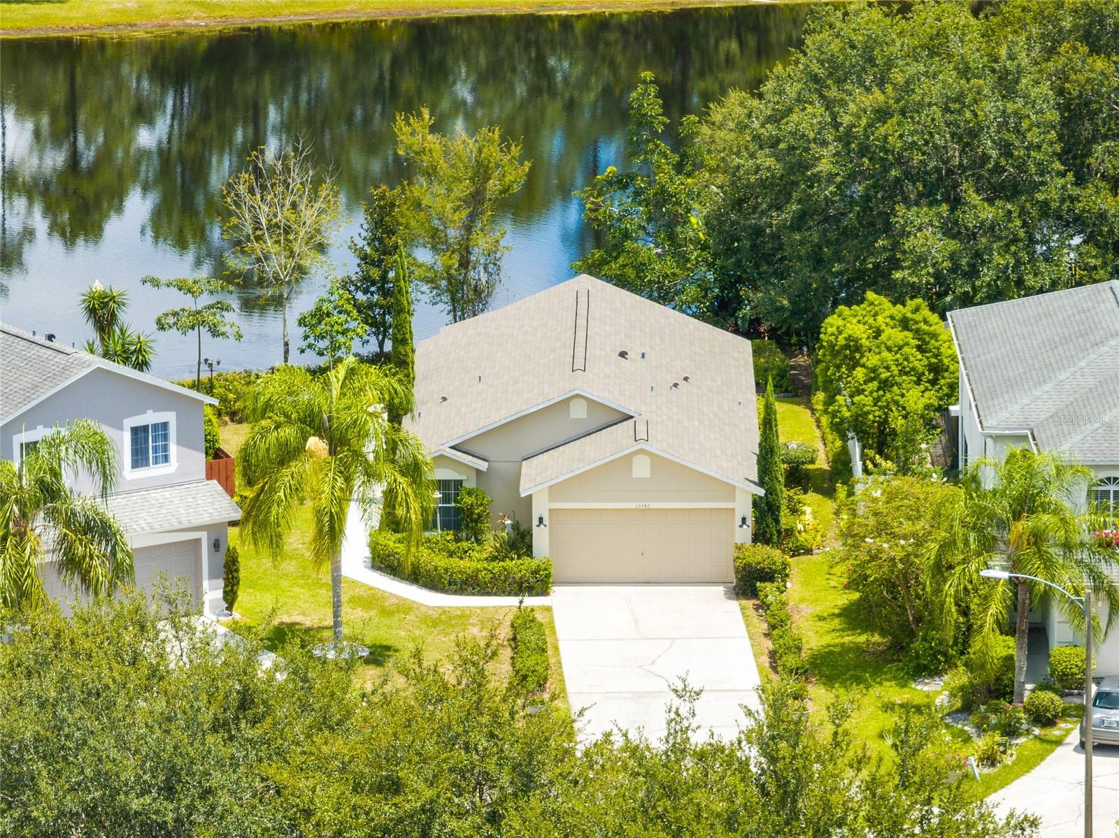Welcome to this beautifully maintained 3-bedroom, 2-bathroom home tucked away on a quiet cul-de-sac in the sought-after Stone Forest community. A long driveway provides plenty of parking, and the freshly painted front door welcomes you home. Enjoy peaceful views of the backyard pond from your covered porch and a layout designed for both function and comfort.
Inside, you’ll find vaulted ceilings, fresh interior paint (2025), and a well-balanced floor plan with one guest room near the front entry, a second guest room tucked privately near the rear (with pond views), and the primary suite positioned nearby with its own ensuite bath and walk-in closet. The living room features sliding doors that open to the covered back porch—perfect for taking in the tranquil pond views. You'll also enjoy water views from the kitchen, dining area, and back guest bedroom.
The kitchen features painted cabinetry (2025), stainless steel appliances, a breakfast bar, and a dining space that opens to the living area—ideal for everyday living or entertaining. Additional features include a newer roof (2018), exterior paint (2018), a newer front door (2017), (2009) A/C with new coils (2025), hurricane panels, and a 2-car garage with laundry, utility sink, and included washer/dryer. The seller will also be installing a brand-new water heater prior to closing for added peace of mind.
Outside, you’ll find a large backyard with partial fencing—offering both open space and some privacy for outdoor enjoyment.
Conveniently located in the East Orlando area, this residence is situated near top-rated schools, shopping centers, dining establishments, entertainment options, and major highways (528, 417 & 408) for easy commuting. Enjoy the proximity to popular attractions like the University of Central Florida, Waterford Lakes Town Center, Downtown Orlando, Medical City, Lake Nona, Florida’s beaches, and the Orlando International Airport.
Priced to sell—this home is a fantastic opportunity for buyers ready to add their personal touch. Flooring needs replacement, and the price reflects this, offering built-in value from day one. Don't miss the opportunity to make this remarkable property your own—Call Today!