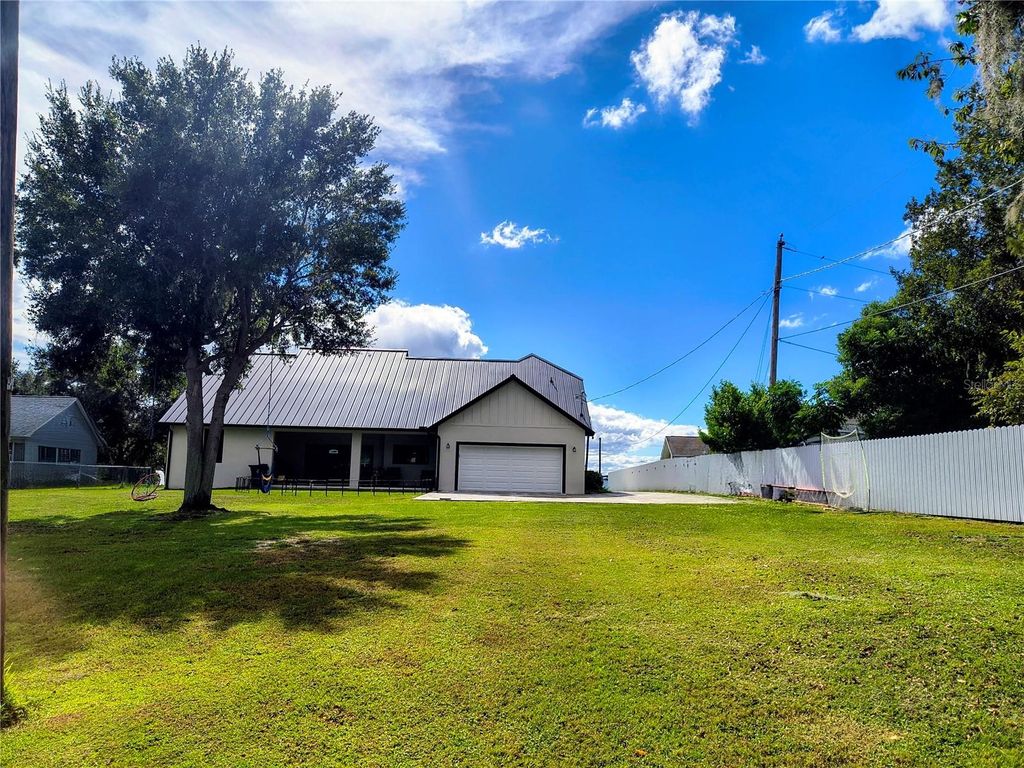Photo of 1070 Lake Ariana Boulevard, Auburndale, FL 33823 (MLS # B4902080)