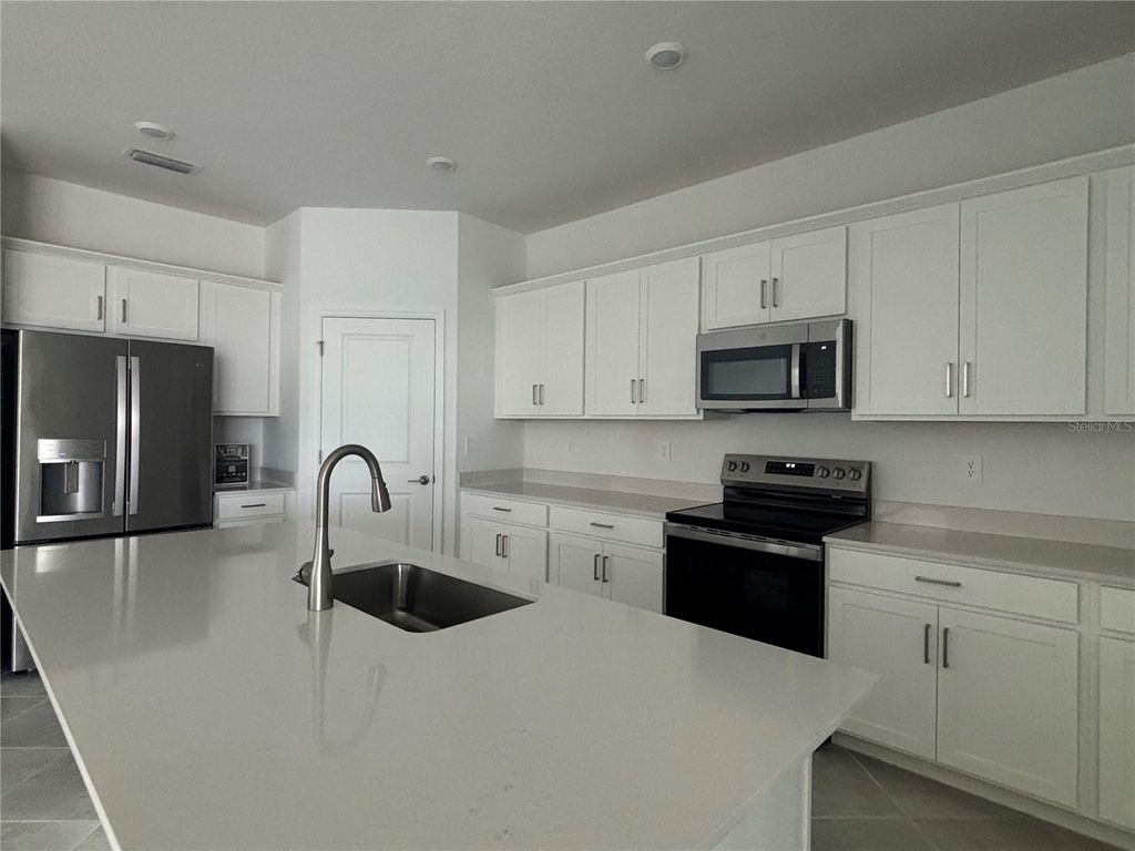 Photo of 7869 Lakes Edge Lane, Port Charlotte, FL 33981 (MLS # C7526297)