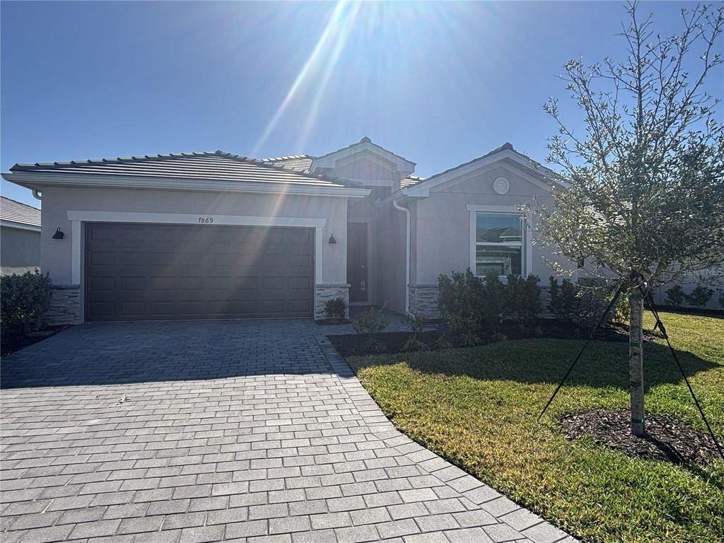 Photo of 7869 Lakes Edge Lane, Port Charlotte, FL 33981 (MLS # C7526297)