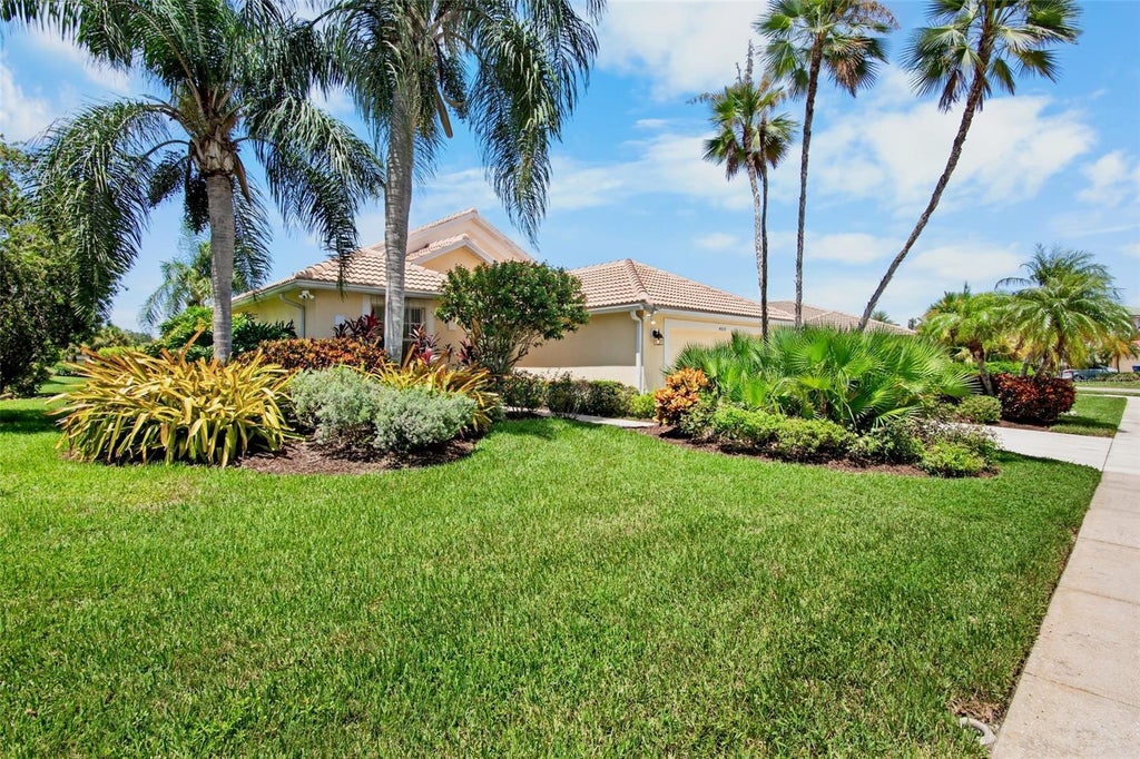 Photo of 4859 Sabal Lake Circle, Sarasota, FL 34238 (MLS # A4701328)