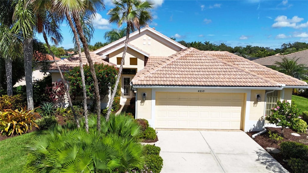Photo of 4859 Sabal Lake Circle, Sarasota, FL 34238 (MLS # A4701328)