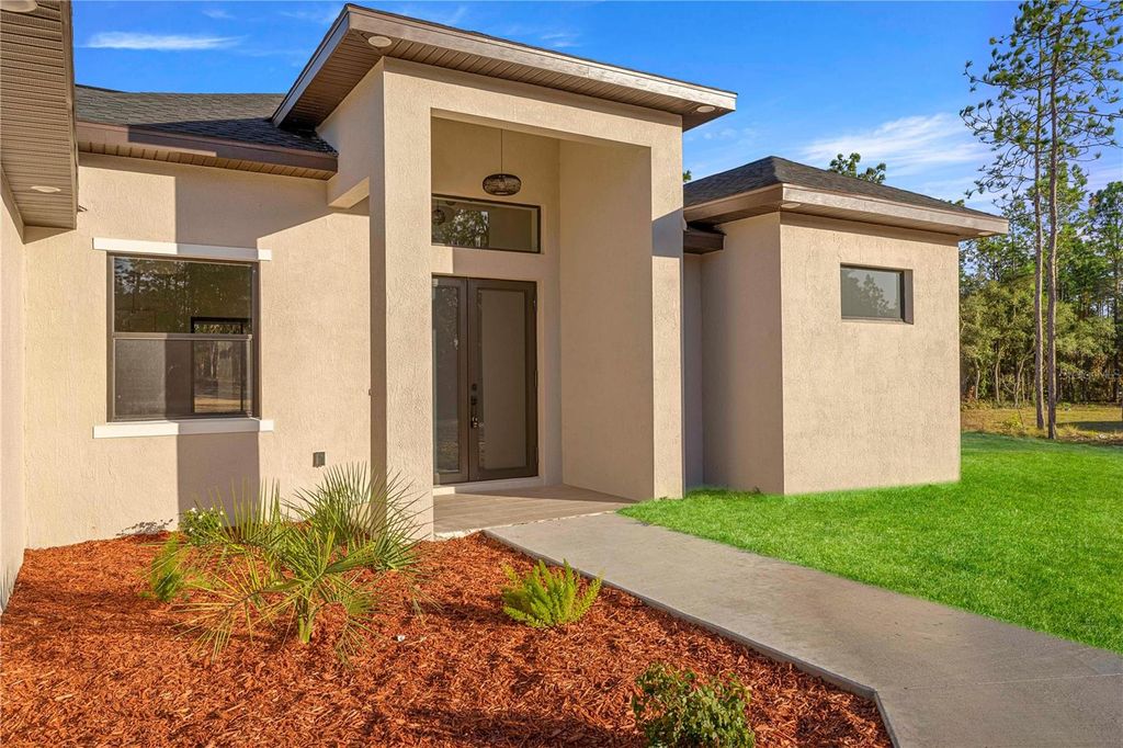 Photo of 8269 SW 138th Terrace, Dunnellon, FL 34432 (MLS # C7519242)