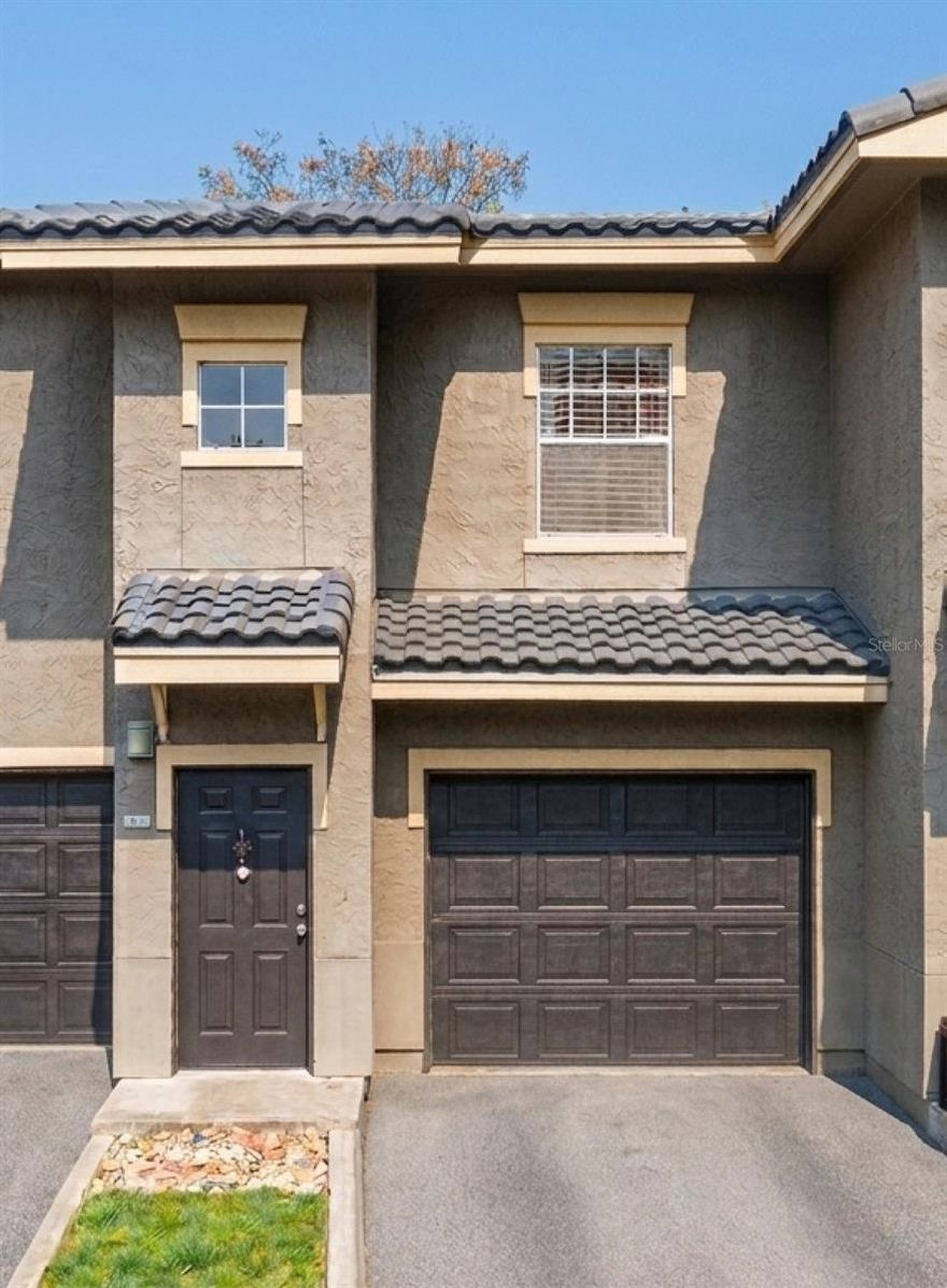 One or more photo(s) has been virtually staged. This beautifully maintained, move-in-ready 2-bedroom, 2-bath second-floor condo with a 1-car garage is located in the highly desirable gated side of the Notting Hill community in Lake Mary/Heathrow.

Unlike standard vinyl or laminate options, this unit features high-end WilsonArt Commercial Grade Estate Plus flooring in a stunning Hawaiian Bamboo finish throughout. Its clean aesthetic, elegant color and texture, comfortable feel underfoot, and exceptional durability mean you can enjoy beautiful floors for generations — without worry about fading, warping, or damage.

Thanks to this unit's orientation, layout, and window placement, nearly every corner is filled with bright yet softly diffused light — not harsh or glaring, but warm and inviting. It's the kind of natural light that simply makes you feel good every day.

Enjoy true one-level living on the second floor, with just one flight of stairs from the garage and front door to the main living space and private balcony. The open, spacious layout creates a comfortable, natural flow between the living, dining, and kitchen areas.

Both bedrooms are generously sized with large walk-in closets. The two full bathrooms are well-positioned to maintain privacy for owners, guests, or roommates alike. The private balcony extends your living space outdoors — perfect for morning coffee or unwinding at the end of the day.

Notting Hill is known for its resort-style amenities, including two community pools, a modern fitness center, an elegant clubhouse, a playground, and tennis and pickleball courts, all managed by on-site staff. The HOA fee covers water, sewer, daily valet trash service, secure key-code building access, and full use of all amenities — delivering a truly low-maintenance, lock-and-leave lifestyle.

The location is a standout. The community borders one of the most scenic stretches of the Seminole-Wekiva Trail, offering direct access to miles of paved paths for walking, running, and biking. You're also just minutes from a wide range of shopping, dining, and entertainment, with convenient access to major employment centers throughout the Orlando metro area.

Commuting is effortless with quick access to I-4 and the 417, placing vibrant downtown Orlando approximately 25 minutes away. World-famous attractions — including Walt Disney World, SeaWorld, and Universal Studios — as well as the beautiful beaches of Daytona and New Smyrna, are typically within an hour's drive, making this an excellent primary residence, second home, or investment property.

If you're looking for a safe, gated community with a spacious, updated condo, a private garage, resort-style amenities, and an unbeatable Central Florida location steps from the Seminole-Wekiva Trail, this Notting Hill home is truly move-in ready and waiting for its next owner.