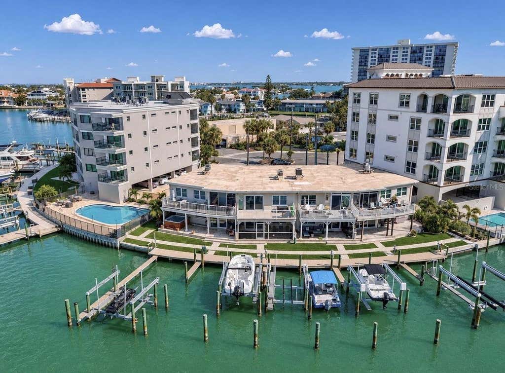 Photo of 205 Dolphin Point #4, Clearwater Beach, FL 33767 (MLS # TB8533575)