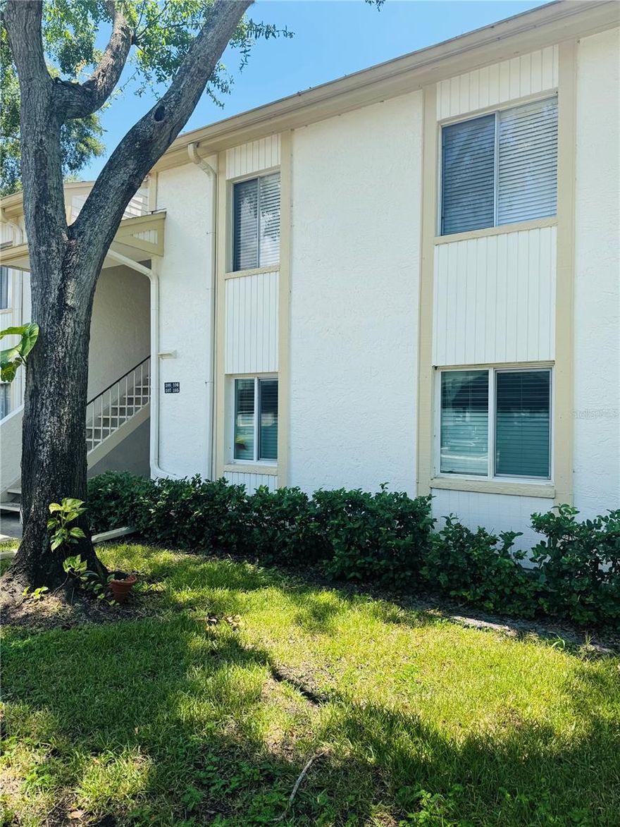 Welcome to the beautifully mainted 2 bedroom 2 bath Second floor Condo. Located in the desirable Gated community of East Lake Woodlands. This condo features New LVP flooring throughout offering both easy maintenance and style. This condo has a nice open floor plan with loads of natural light! The Kitchen opens to the Living/dining room. The Kitchen features Stainless appliances and an additional cabinet/counterop for additional storage + a pantry. The Primary suite is spacious and has 2 walk in closets & a sliding door out to lanai.  The ensuite bath comes with a walk in shower and linen closet. The second bedroom has a wall closet and bath room with Tub/shower just steps away. This condo is ready for move in. The AC system installed NEW July 2024!  Enjoy the tranquility of this established neighborhood wihle being minutes away from Shopping, Restaurants, Entertainment, Medical facilities and A+ Schools! Perfect for Full time residents or a Seasonal getaway to escape the cold this winter! 30 minutes from Tampa Int Airport & St Pete Airport. The BEST BEACHES 20 minutes out!  Perfect Location!