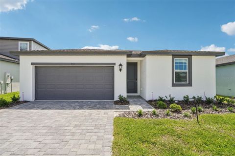 Photo of 791 Sunshower Drive, Lady Lake, FL 32159 (MLS # O6372013)