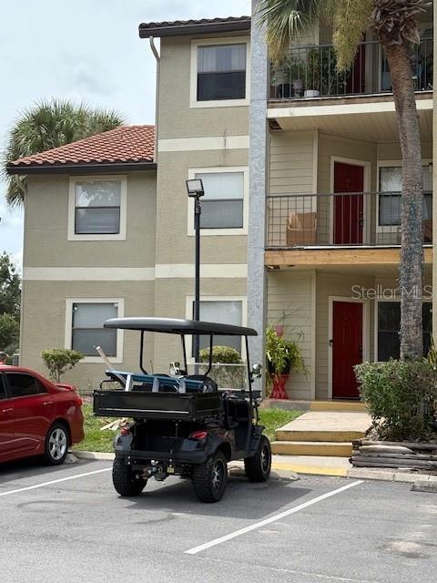 LOCATION, LOCATION, second floor condo conveniently located near Disney and other attractions. walking distance to shops, transportation, restaurants and much more. condo features all tile flooring, new refrigerator, new dishwasher and freshly painted, etc.. end balcony unit.