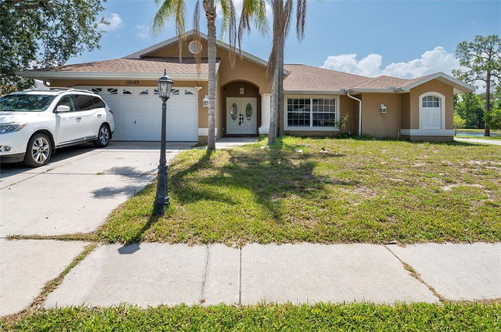 Photo of 10149 Briar Circle, Hudson, FL 34667 (MLS # TB8461836)