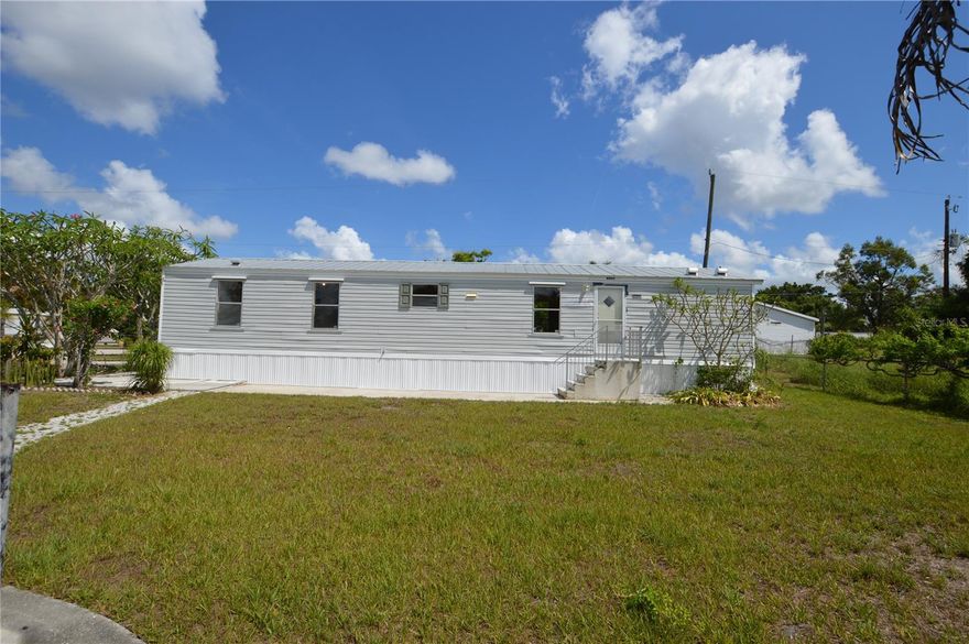 Investor Opportunity or Affordable Florida Living in Punta Gorda! This 2-bedroom, 2-bath mobile home sits on approximately 1/3 acre across multiple platted manufactured/mobile home lots, offering a rare opportunity for extra space, future expansion, or additional income potential.
Perfect for an owner-occupant looking to enjoy their own property with room to grow, the property already includes an additional concrete slab with its own water hookup per the seller — ideal for the possibility of adding another mobile/manufactured home for extended family, guests, or future rental income.
The home features a durable metal roof, Newer central A/C, no lot rent since you own the land, plus a nice detached shed/workshop. The fenced yard offers plenty of room for pets, outdoor activities, parking, storage, or gardening.
Conveniently located just minutes from downtown Punta Gorda, shopping, dining, waterfront attractions, and I-75, this property combines affordability, flexibility, and future potential in one convenient location. The home could use some carpet & paint, making it a great opportunity to personalize and add value over time.
Whether you’re looking for a primary residence, seasonal home, family compound setup, or investment opportunity, this property offers multiple possibilities at an affordable price.
Schedule your showing today!