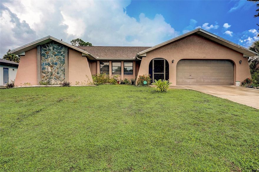 Introducing a charming 3-bedroom, 2-bath home in Port Charlotte, Florida, spanning an expansive 1900 square feet. This residence boasts a spacious living room, complemented by a generously-sized family room for ample gathering space. Enjoy the serene screened-in porch, perfect for outdoor entertaining. This home has been recently painted on the interior and the roof and AC were replaced this year!! Conveniently located near a variety of shops, restaurants, and dining options, this home offers both comfort and accessibility for its lucky new owners.