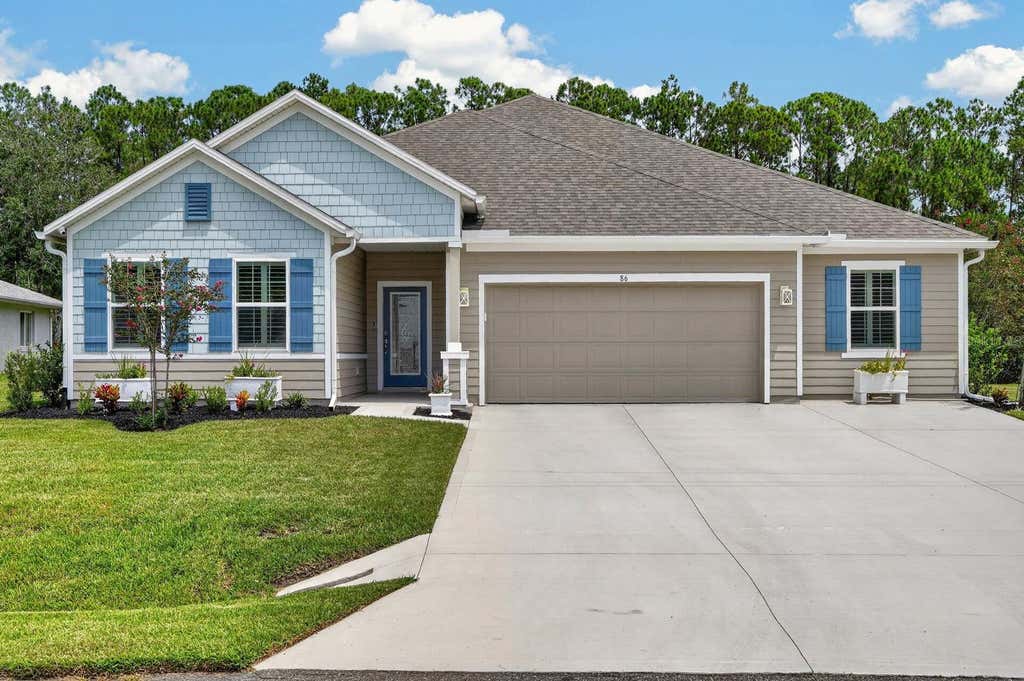 Photo of 86 Whispering Pine Drive, Palm Coast, FL 32164 (MLS # FC320898)