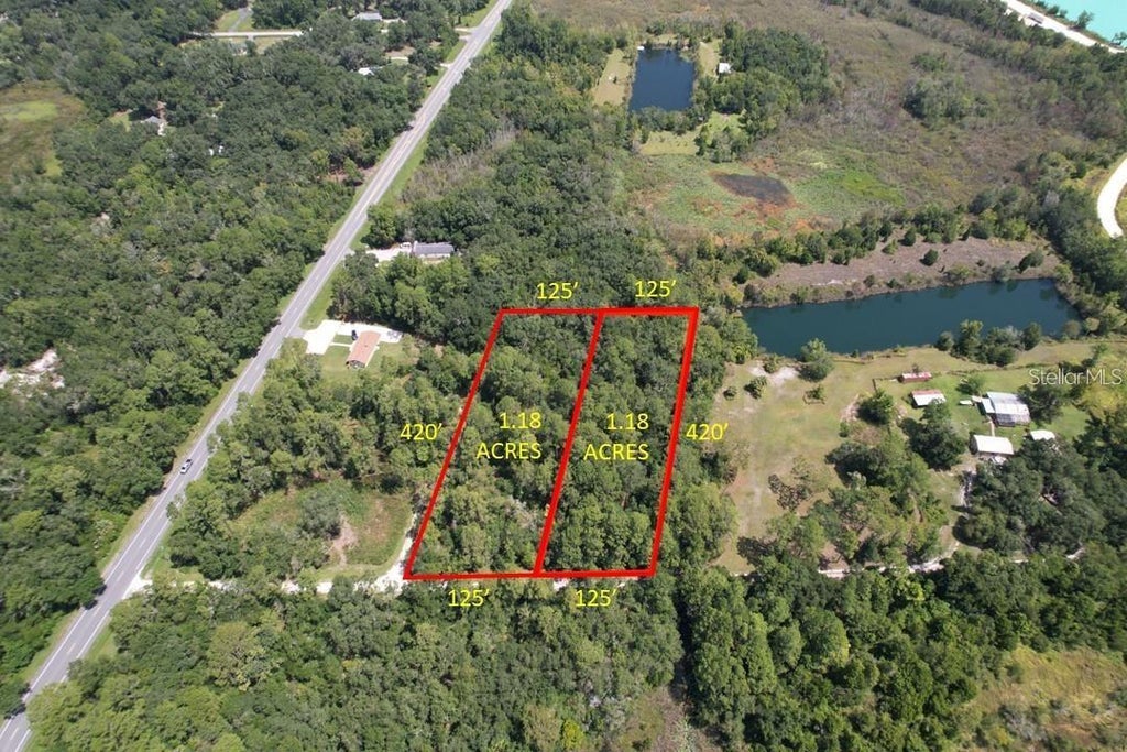 Photo of Merryhill Drive, Webster, FL 33597 (MLS # TB8546216)