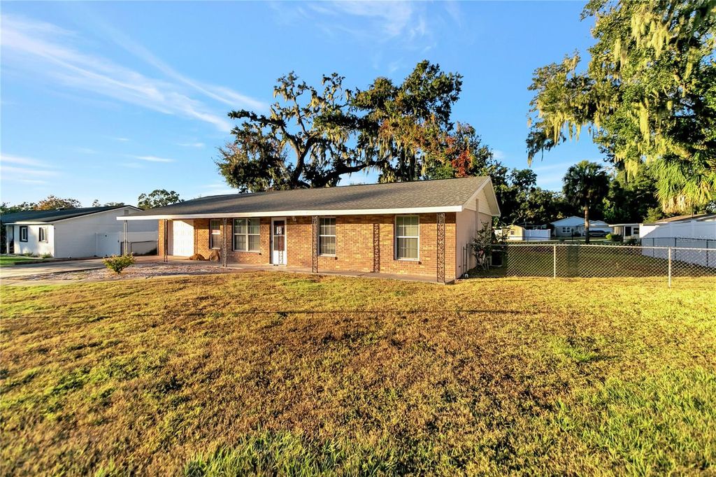 Photo of 609 W Remington Road, Lakeland, FL 33813 (MLS # TB8452269)
