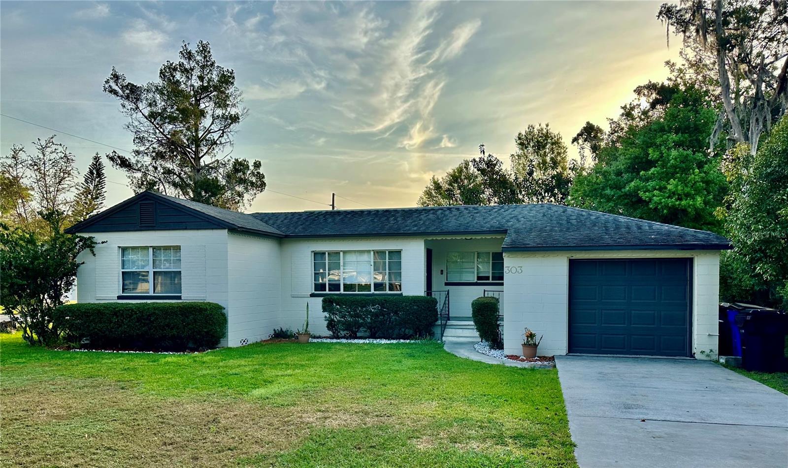 STOP THE CAR!! This darling renovated home is just a few streets down from a sandy beach on East Lake Tohopekaliga. This Home sits on a corner lot and has 3 bedrooms, 1 full bathroom, and a stacked 2 car garage to store your boat or other fun toys you may have. The kitchen has newer cabinets, granite and a full appliance package with fridge, stove, microwave and dishwasher. ThEnjoy the huge yard and shed for extra storage space. The Yard has toms of space for you to bring your toys or build that perfect workshop! Call today as this home will not last!
