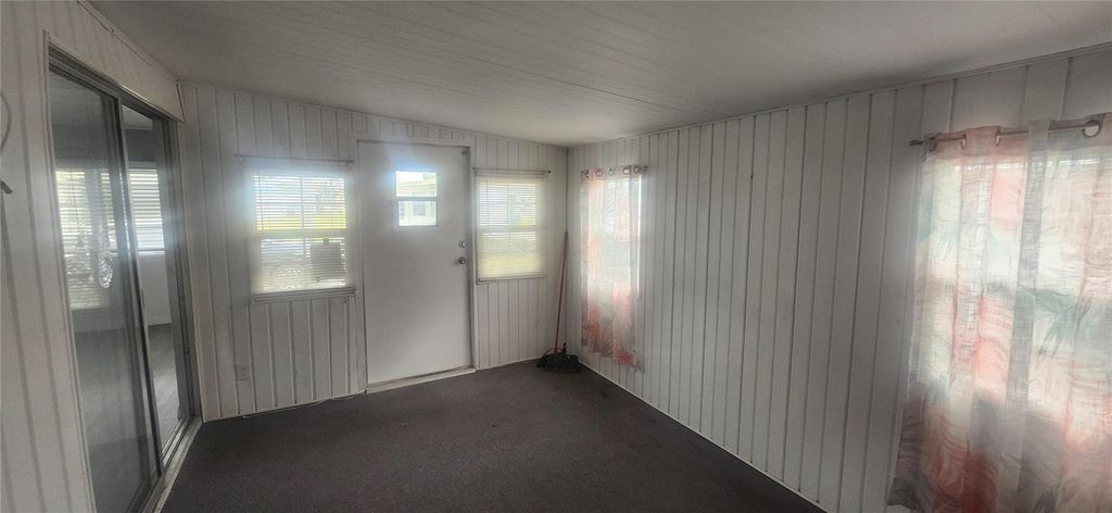 Photo of 10909 Freedom Drive, Port Richey, FL 34668 (MLS # W7880081)