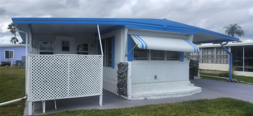 Photo of 10909 Freedom Drive, Port Richey, FL 34668 (MLS # W7880081)