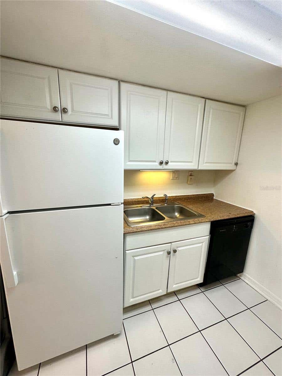 Photo of 1452 Holden Avenue #H8, Orlando, FL 32839 (MLS # O6418507)