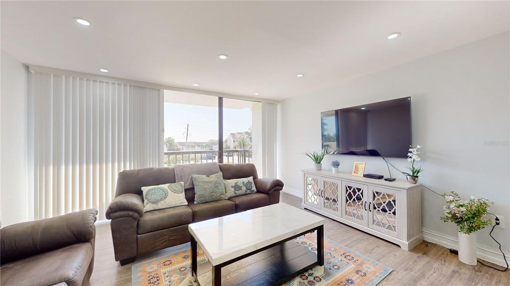 Photo of 400 Island Way #210, Clearwater Beach, FL 33767 (MLS # TB8376721)