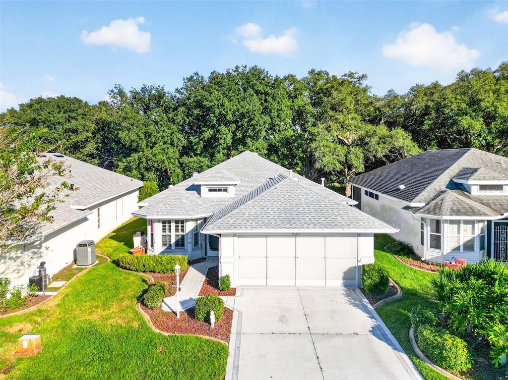 Photo of 21848 Royal St Georges Lane, Leesburg, FL 34748 (MLS # G5119048)