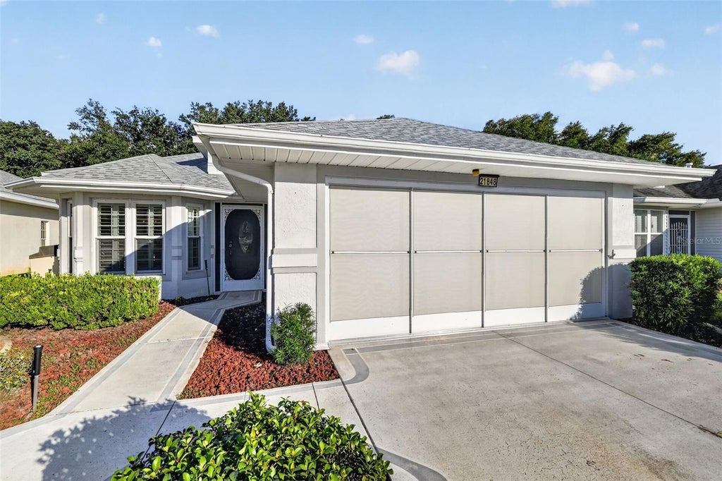 Photo of 21848 Royal St Georges Lane, Leesburg, FL 34748 (MLS # G5119048)