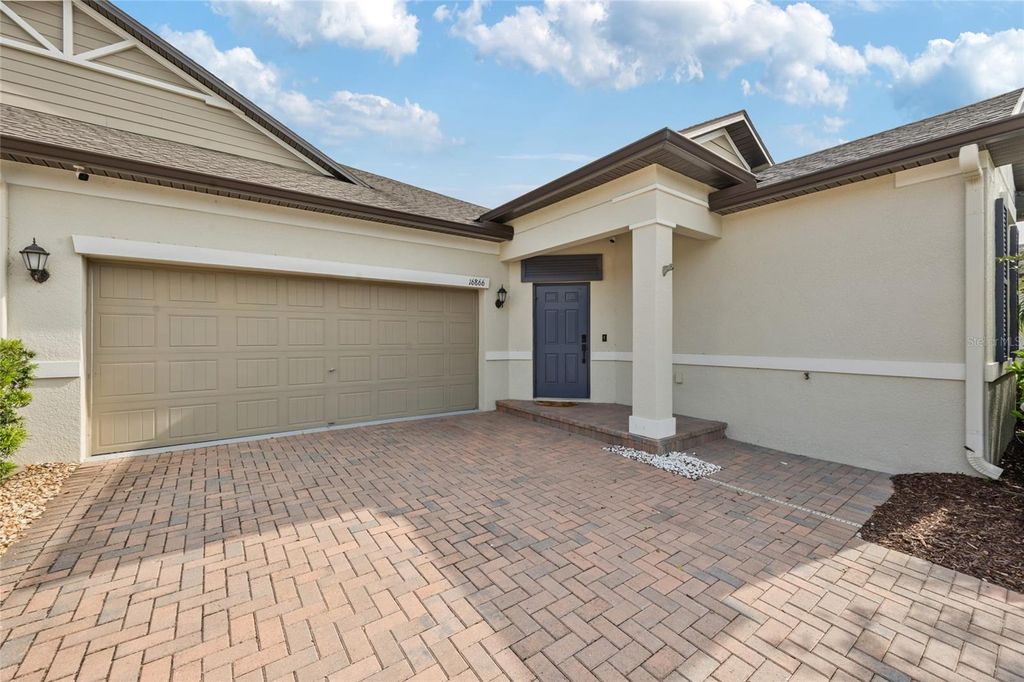 Photo of 16866 Balance Cove, Land O Lakes, FL 34638 (MLS # TB8384128)