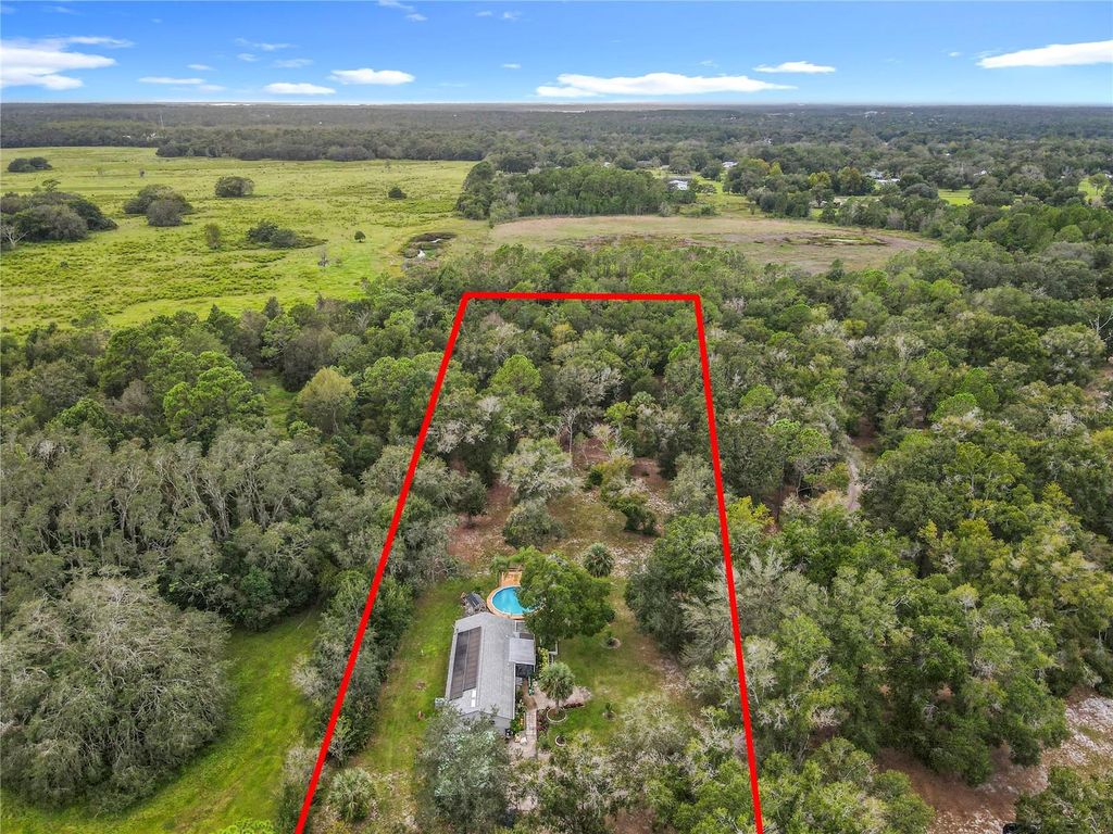 Photo of 22850 Winterwillow Lane, Eustis, FL 32736 (MLS # O6348021)