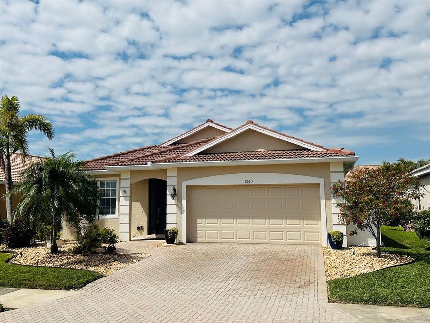 Brand new tile roof installed December 2024. Welcome to the serene Stonybrook community, where modern elegance meets spacious comfort in this stunning 3-bedroom plus large den/office, 2-bathroom property. Nestled amidst pristine surroundings, this home boasts a generous floor plan with ample storage space throughout, including extra storage with shelving and ceiling racks installed in the garage. The heart of the home features a gorgeous island, complemented by sleek cabinets, an induction range with air fryer, and quartz countertops installed in the laundry area with washer and dryer. Step outside to discover the ultimate oasis, complete with new landscaping and irrigation system, along with a brand new enclosure surrounding the inviting pool, finished with a pristine surface around the lanai with a waterview. Additional highlights include a newer pool heater for year-round enjoyment, newer AC system with air purification for optimal efficiency and better air quality, and extra wide gutters around the entire roof for added convenience. All of this with low association dues, ensuring both luxury and affordability. Office can be converted into another bedroom. Welcome to your dream home! https://player.vimeo.com/video/939603257?h=c2def308f1